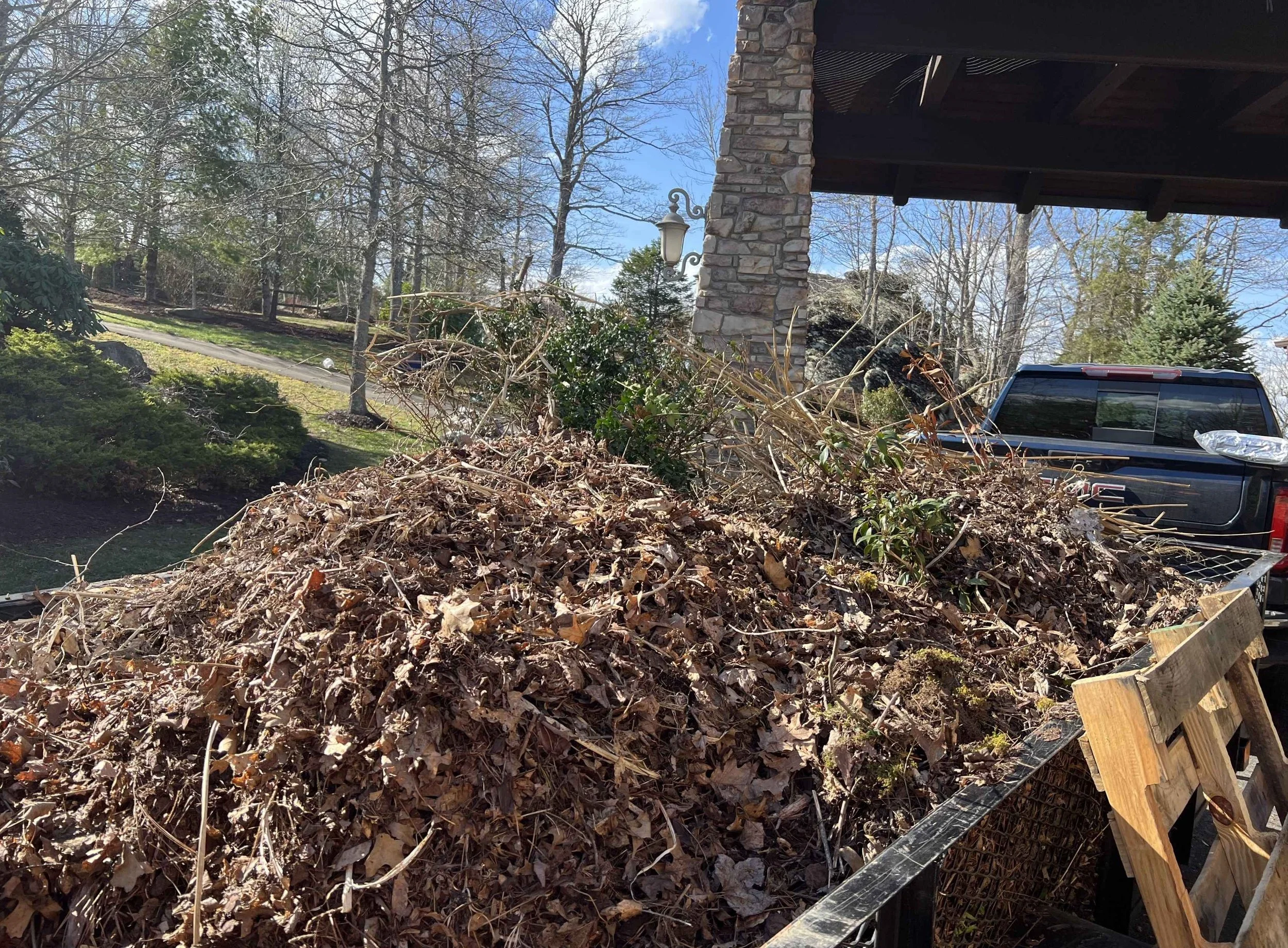 Spring and fall yard cleanup services in Ashe County and Watauga County including leaf removal and seasonal lawn maintenance by Shape Up Lawn Care.