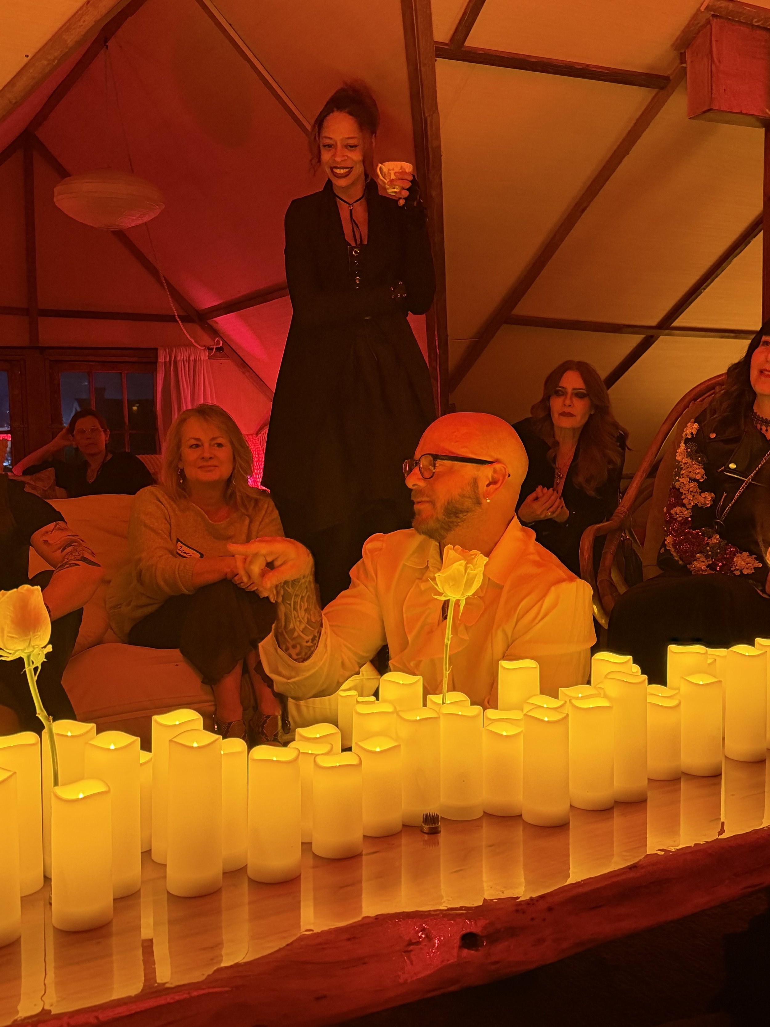Guests gathered during a Curtain Call immersive experience, blending storytelling, social strategy, and meaningful human connection.