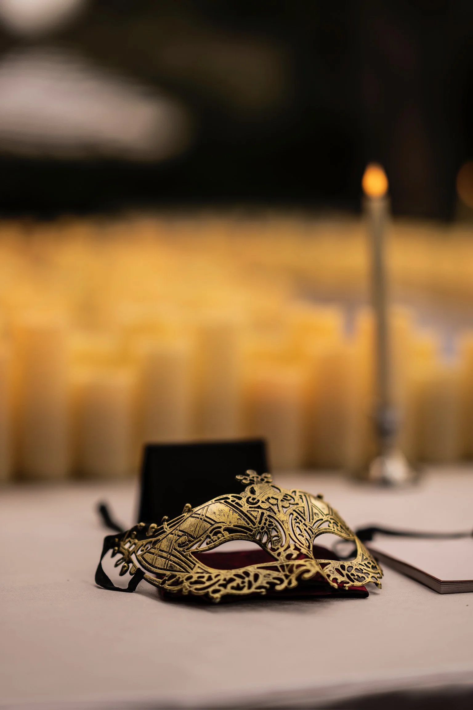A signature mask from Curtain Call's immersive social strategy experience, symbolizing hidden identities, alliances, and social deduction gameplay.