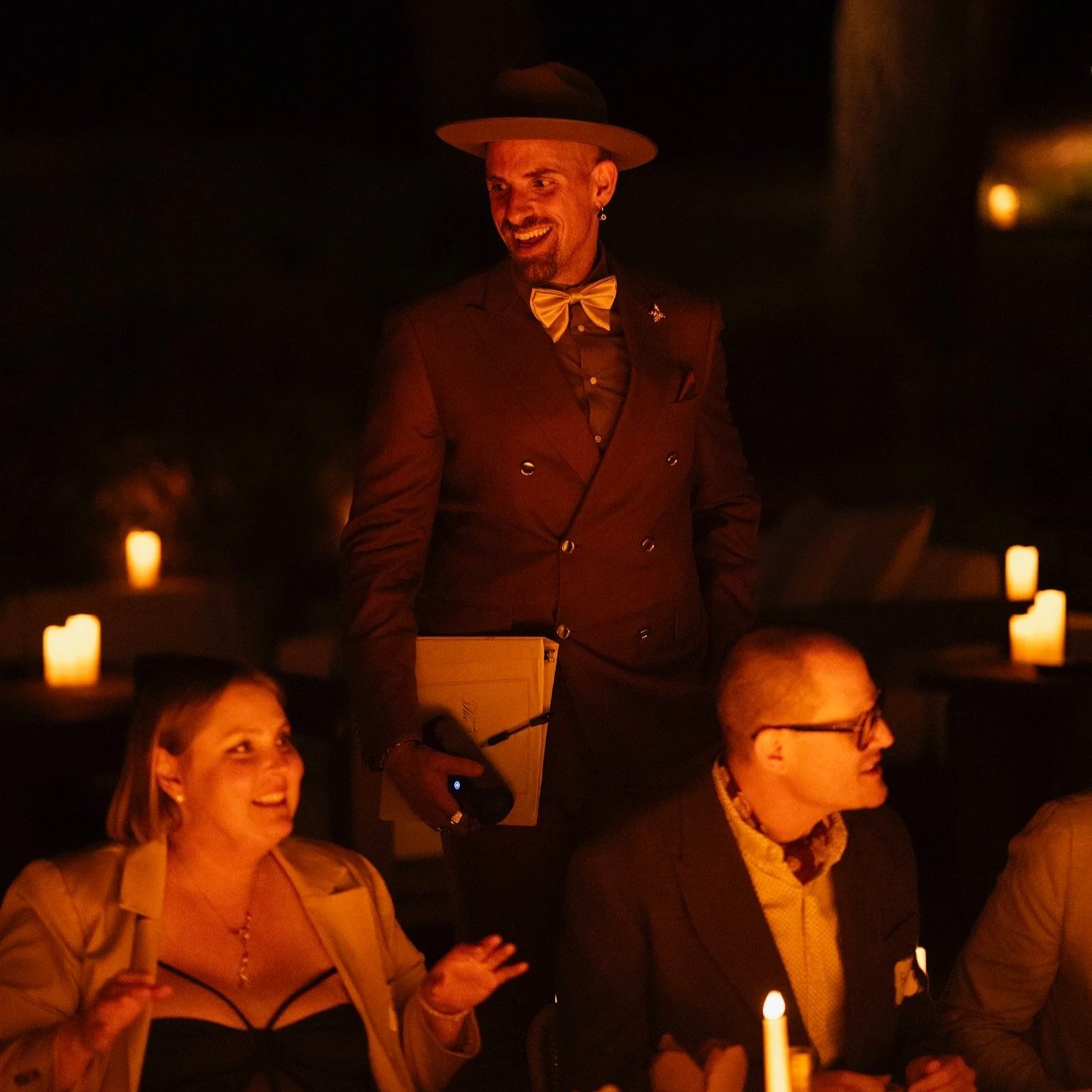 A Curtain Call host guiding guests through an unforgettable evening of immersive entertainment, strategic gameplay, and unexpected twists.