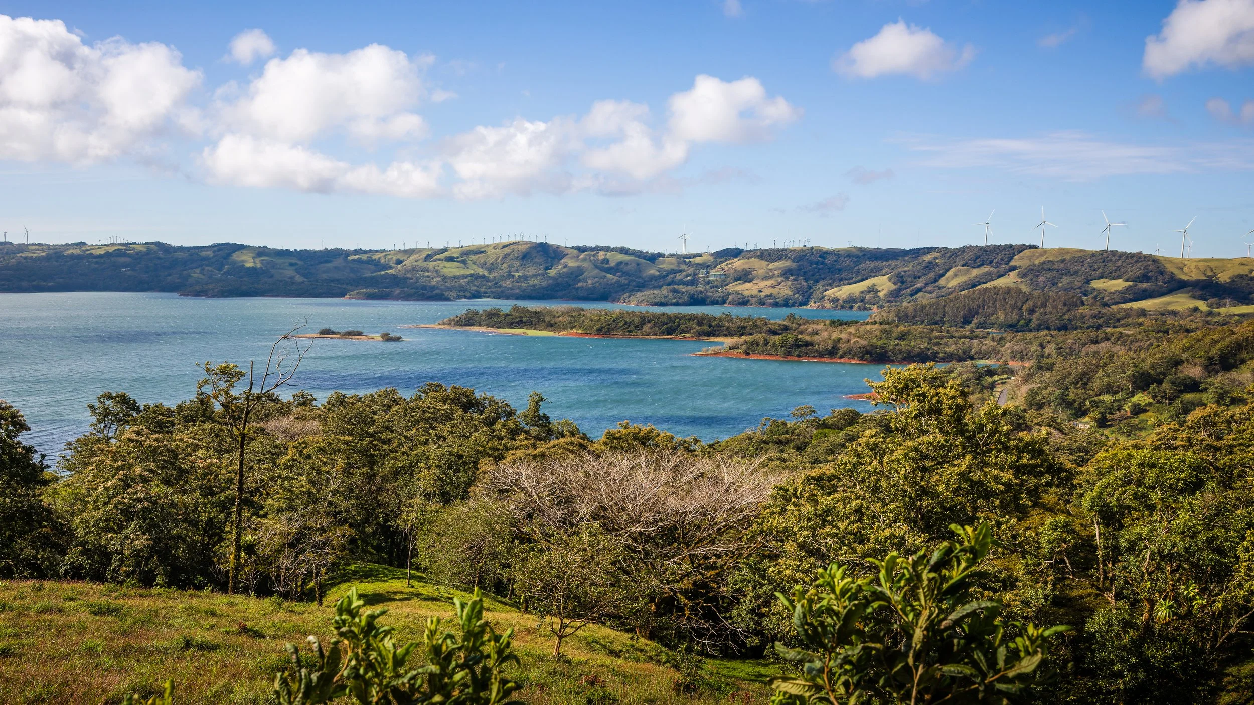 Lake Arenal landscape with wind turbines, Costa Rica