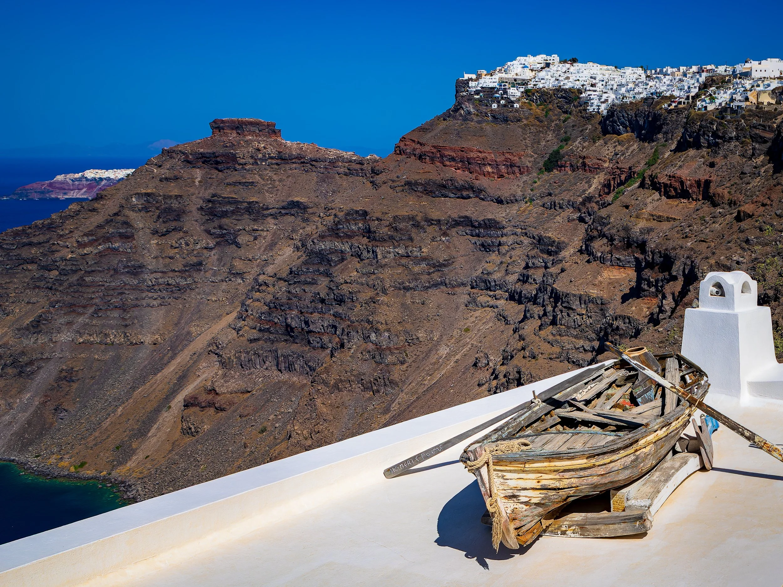 Boats on the Santorini caldera viewed from Fira, Greece