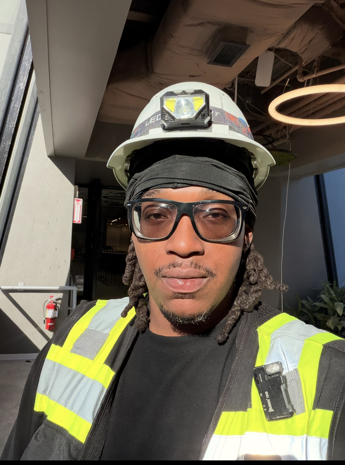 Samuel Lovett working in the field installing and coordinating building systems for OcuBuild Technologies