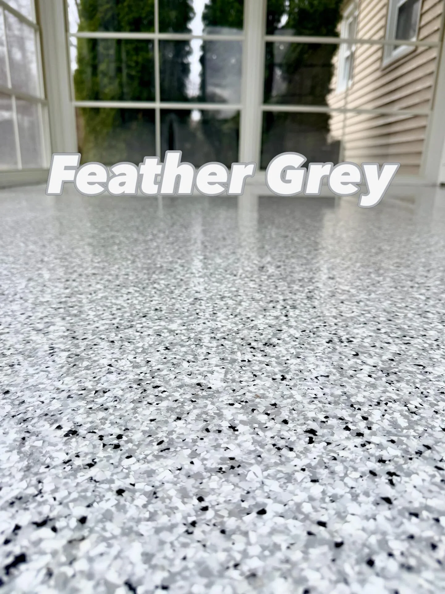 Two floors one home. We gave this sunroom a floor it deserves. Durable and UV stable. Feather grey flakes with a gloss polyaspartic topcoat. Now this room is ready for entertaining. As far as the garage, it was cooked! #simiron 1150fc and domino flak