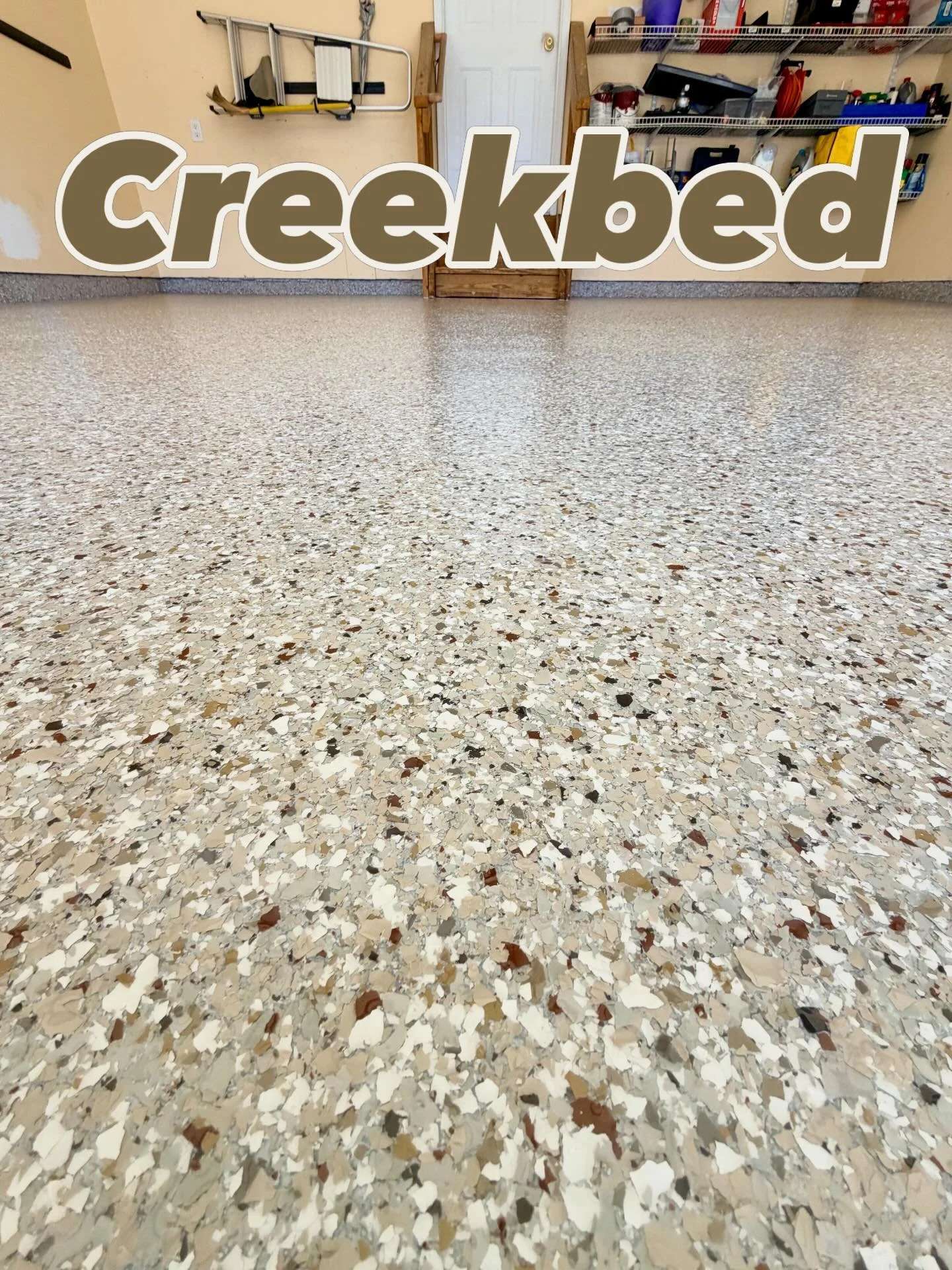 Took this two car garage and gave it some new life. Creekbed decorative flakes for this one day floor. #simiron polyaspartic flake system is durable, sleek, and UV-stable. Call us today to get your free estimate.