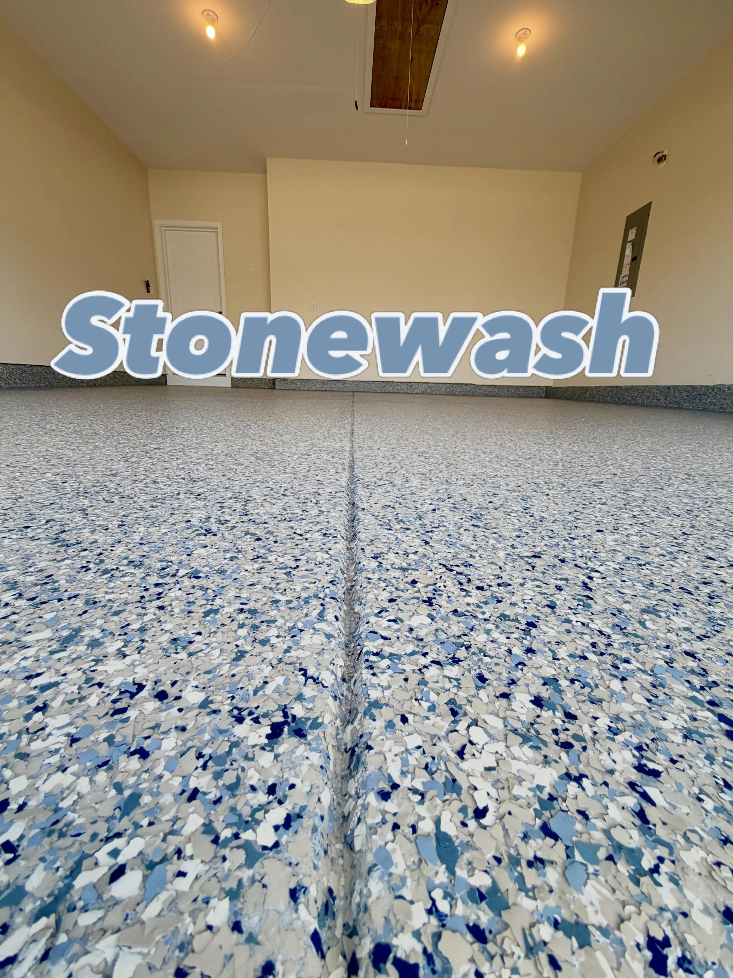 Loving this color flake! Stonewash decorative flake on this 2 car garage really makes it feel like a living space. Durable and sleek made to transform any room! #simironcoatings #elit3garagefloors #epoxy #polyaspartic