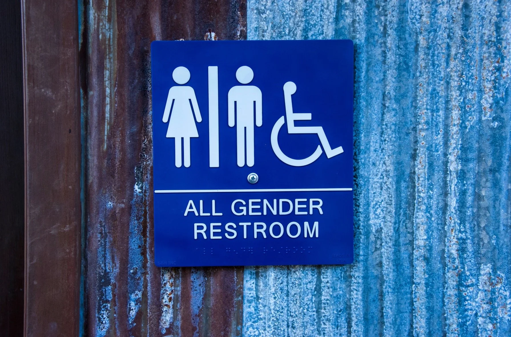 Image of a sign for an all gender restroom