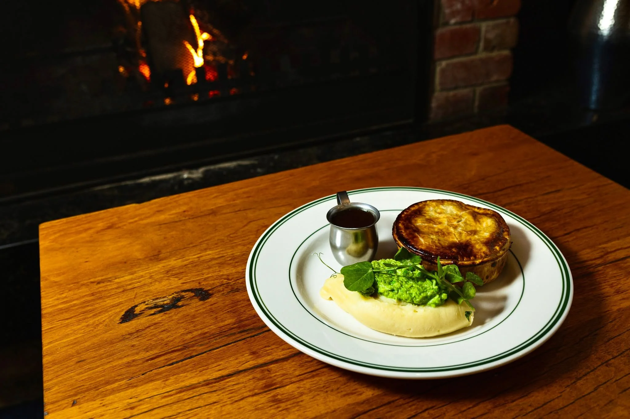 Tomorrow, take a seat by our fireplace for Pie Night.

From 5pm every Thursday, tuck into on our slow-cooked beef and Guinness pie served with mash, crushed peas, mozzarella and gravy for just $22.

Head in early for Happy Hour from 3-6pm, with wines