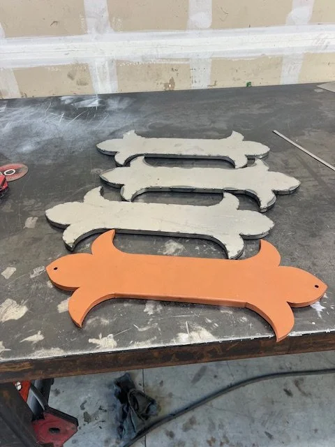 Custom one-off metal bracket fabrication in Downtown Dallas, TX, precision-built for a high-end luxury hotel project. This custom steel component was plasma cut and finished to exact specifications, showcasing detailed craftsmanship and high-end meta