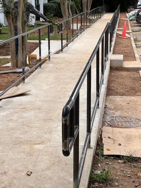 Local ADA handrail installation contractor in DFW providing custom metal railings for accessibility compliance, including dual rail systems, proper height spacing, and continuous handrail design.