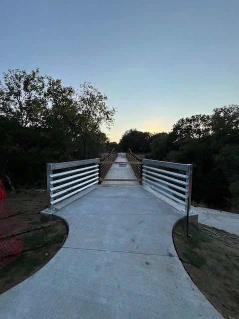 Professional galvanized steel railing fabrication and installation in Fort Worth, TX, showcasing durable guardrails for pedestrian bridge access and outdoor walkways. This custom metalwork project highlights precision-built steel railings designed fo