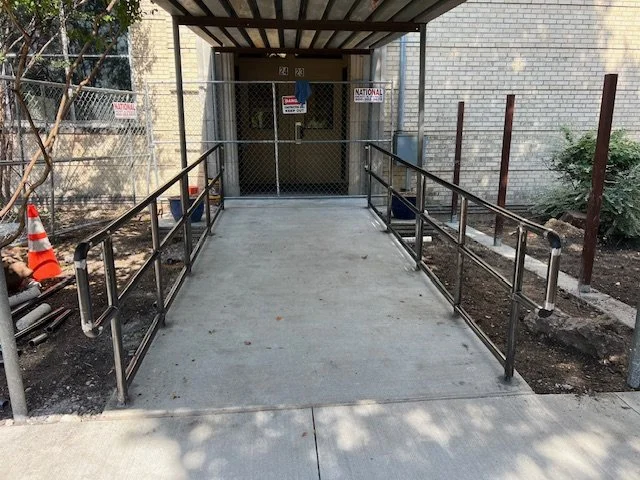 Code-compliant ADA ramp handrails in Fort Worth, TX, designed for safety, durability, and accessibility in high-traffic environments including schools, offices, and public infrastructure.
