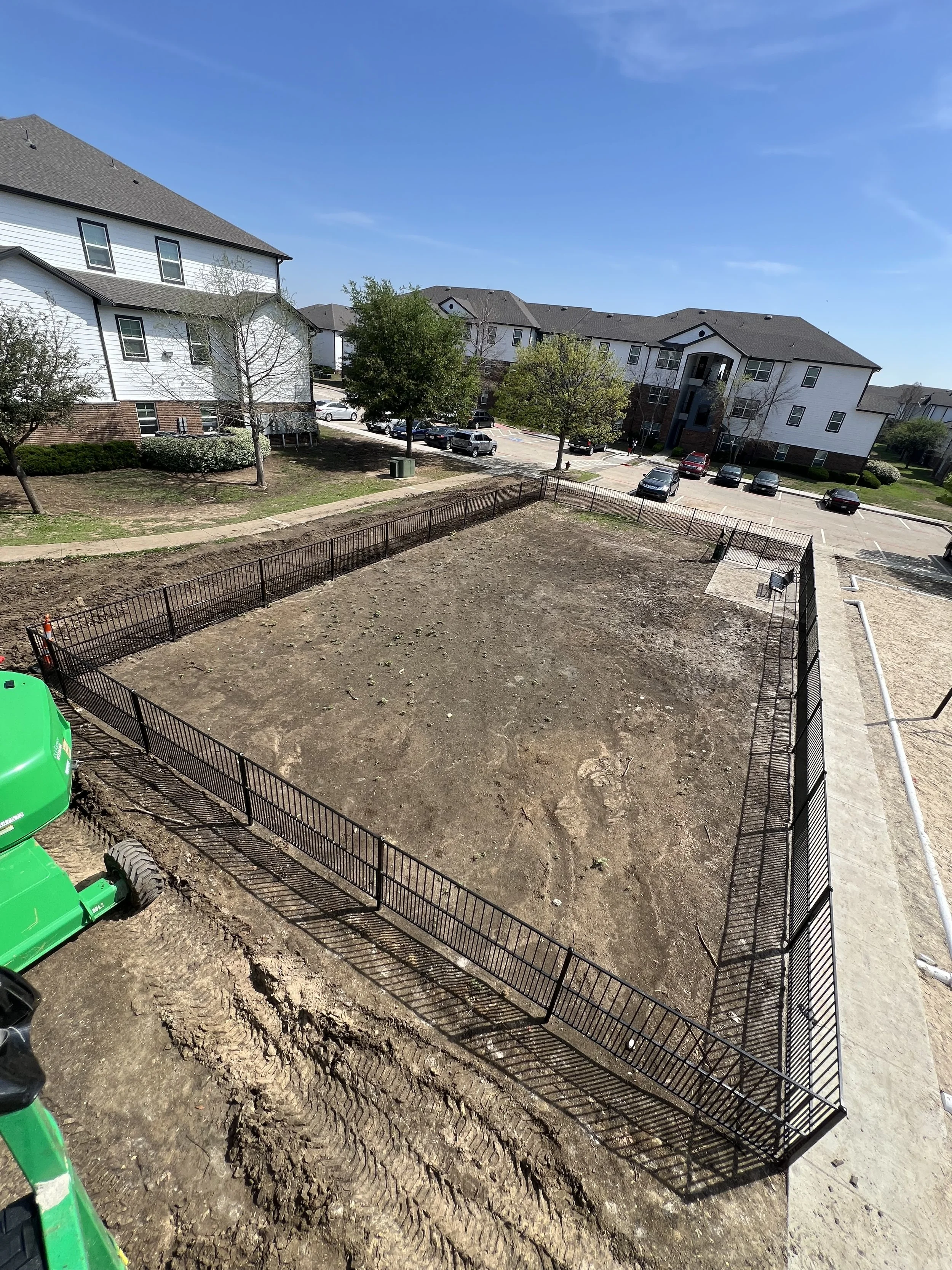 This metal pet area fence was professionally installed for an apartment community to create a safe, enclosed dog park for residents. Designed for durability and security, the fencing provides a designated pet-friendly space while enhancing the proper