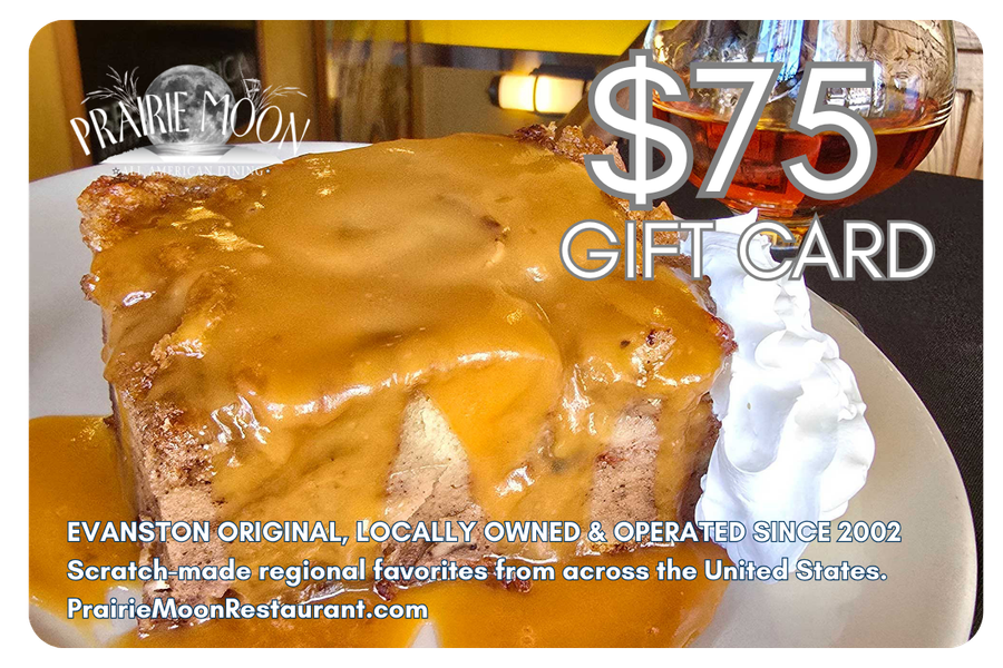 A dessert with a cinnamon roll covered in caramel sauce and whipped cream on the side, with a glass of amber-colored beverage in the background, on a white plate. Text overlay indicates a $75 gift card for Prairie Moon restaurant.