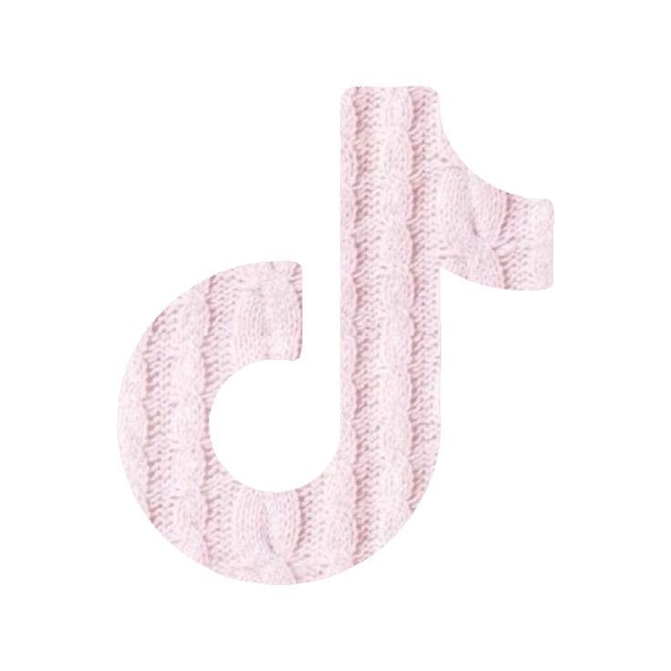 A large letter 'd' made of pink knitted fabric.
