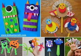 A collection of colorful, handcrafted felt and paper crafts including monsters, ducks, and farm animals.