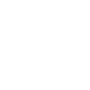 A landline telephone with a rotary dial and a corded receiver.