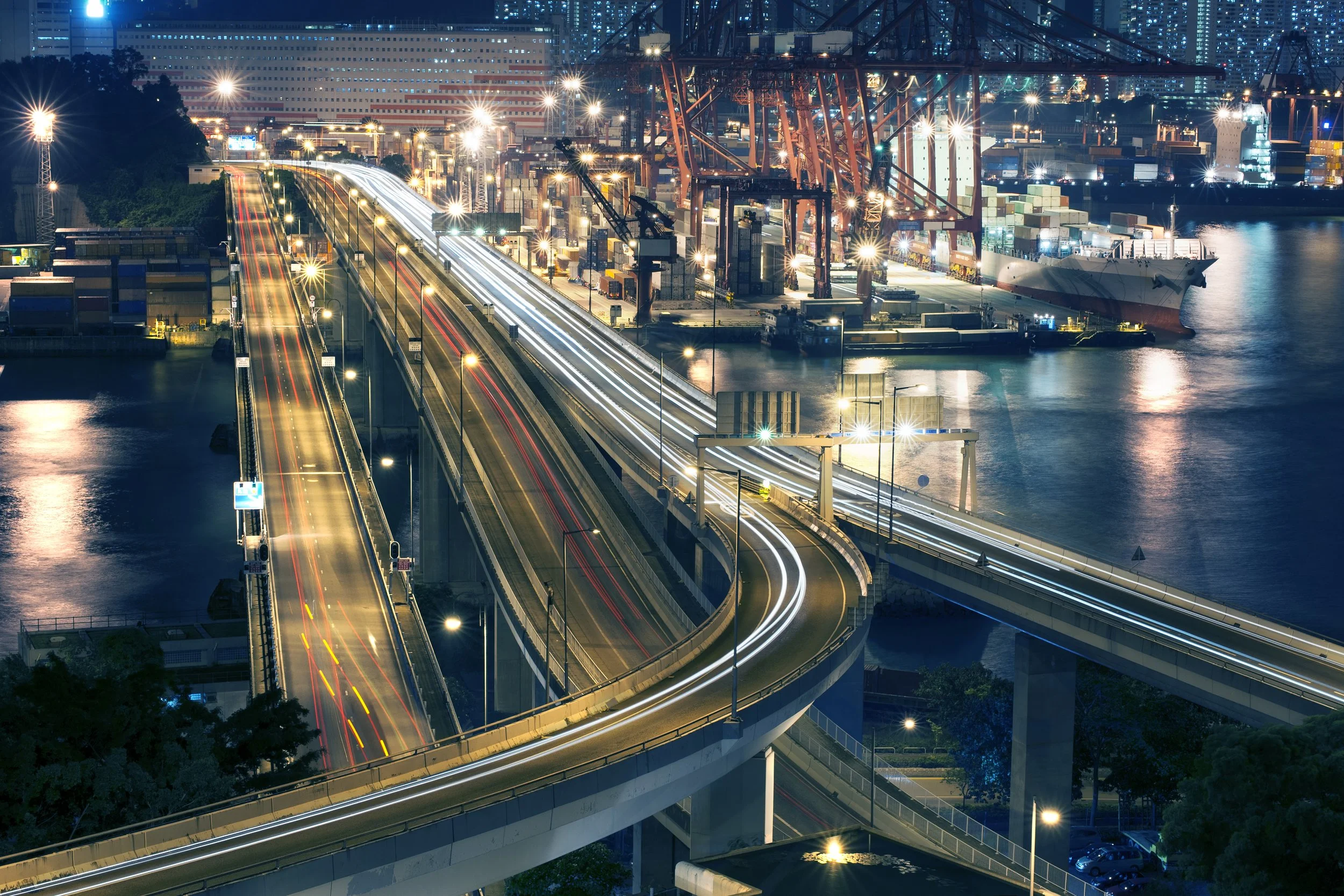 Busy port at night time - Golden Arrow