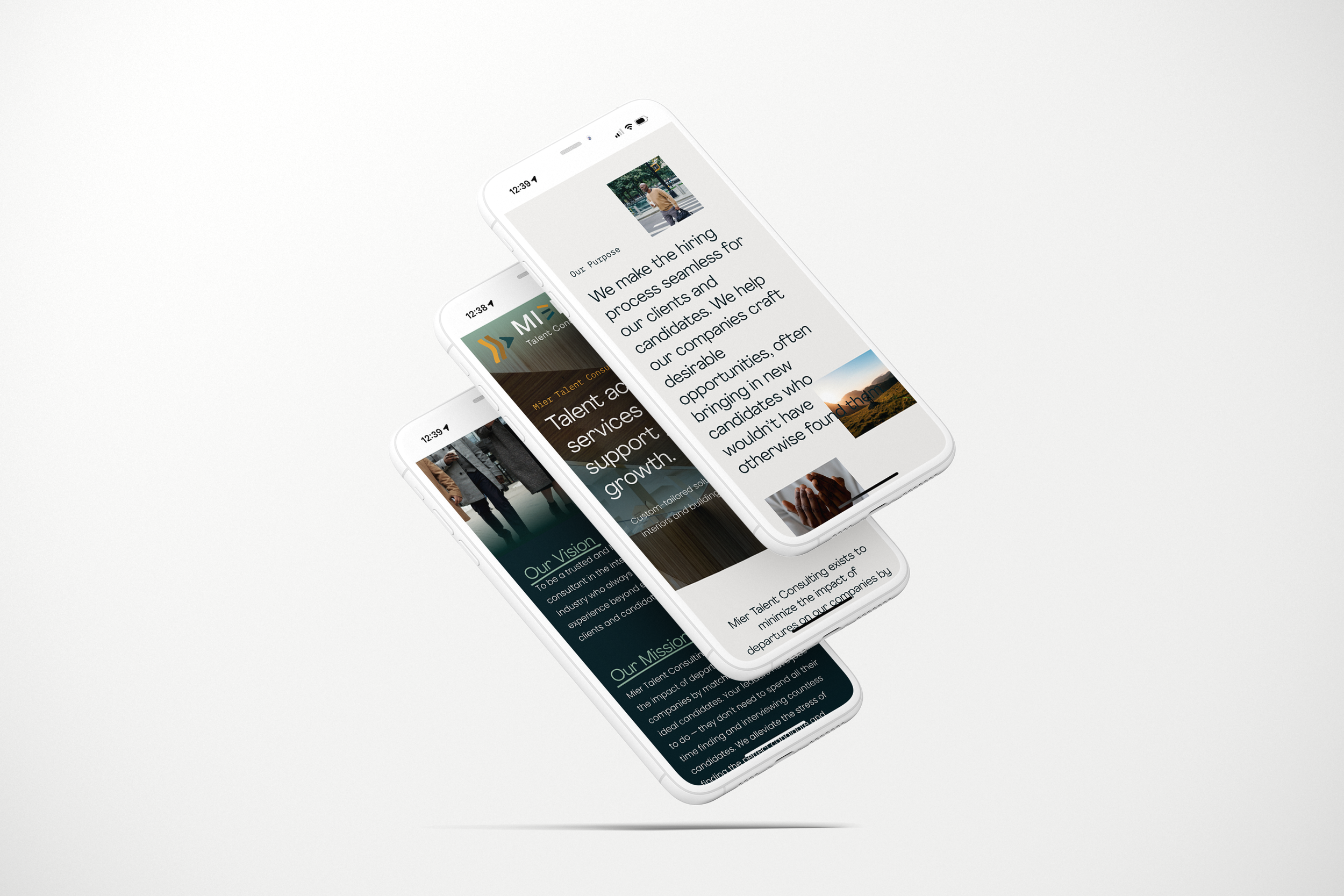 Two white smartphones displaying websites on their screens, placed on a light gray surface. The screens show text and images related to business or professional topics.