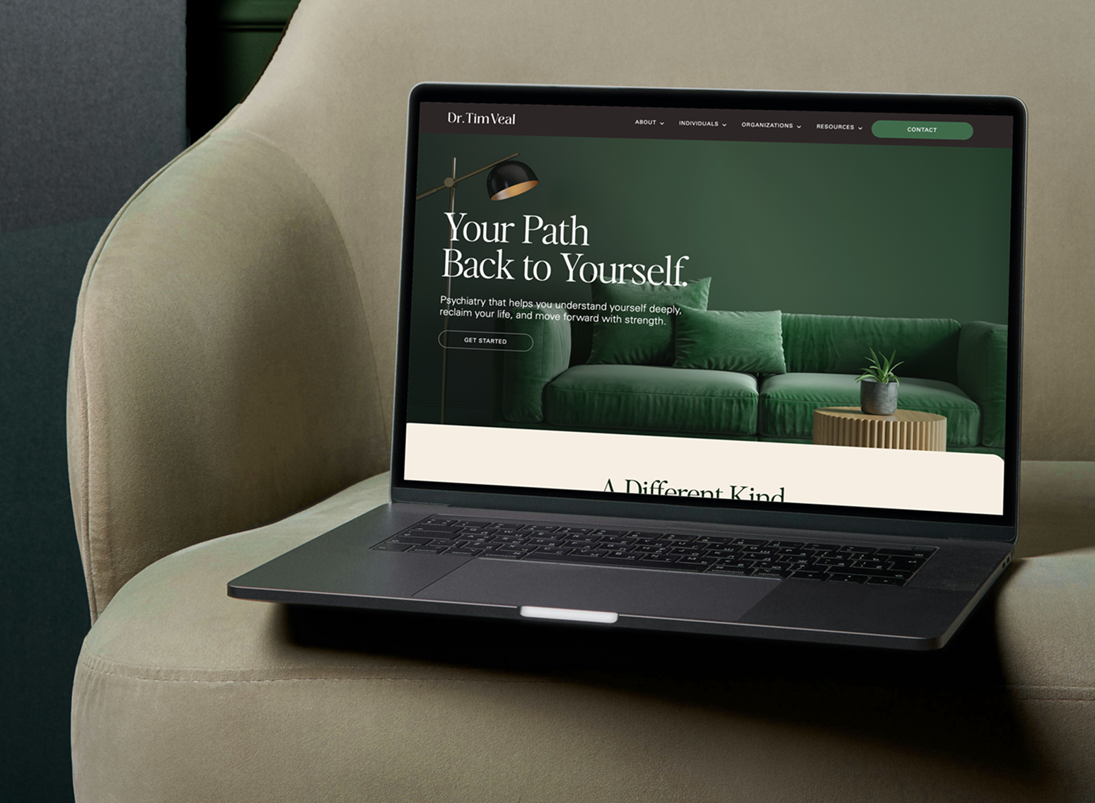 Laptop on a beige chair showing a website for therapy entitled "Your Path Back to Yourself." for Dr. Tim Veal in San Diego, California.