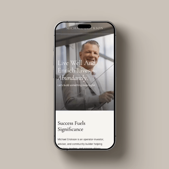 A smartphone displaying a website with a portrait of a smiling man in a suit. The website's text includes 'Live Well And Enrich Lives Abundantly' and 'Success Fuels Significance.'