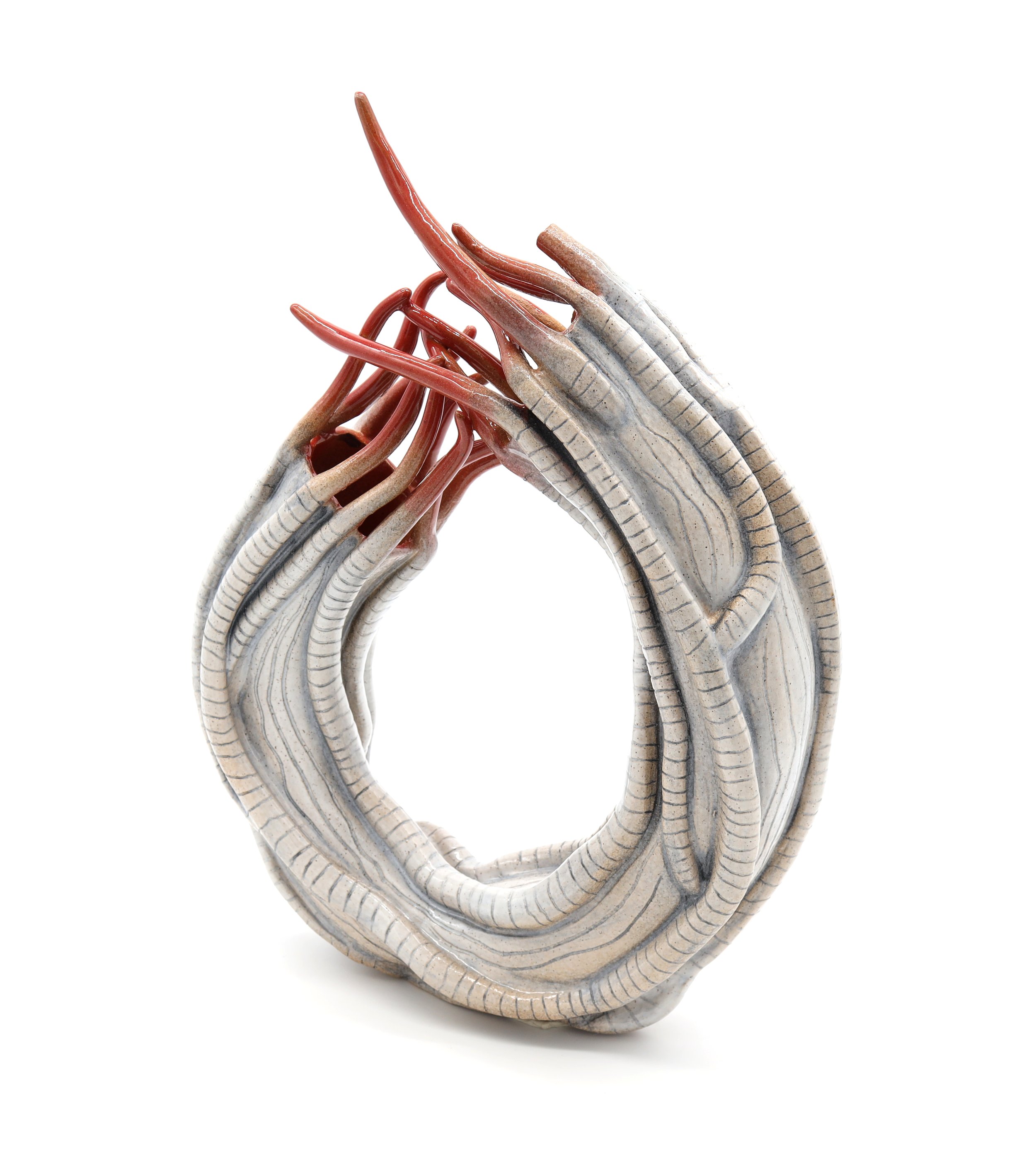 Emergence,
Ceramic, 2024,
16.5” X 13.75” X 3.5” (H X W X D)