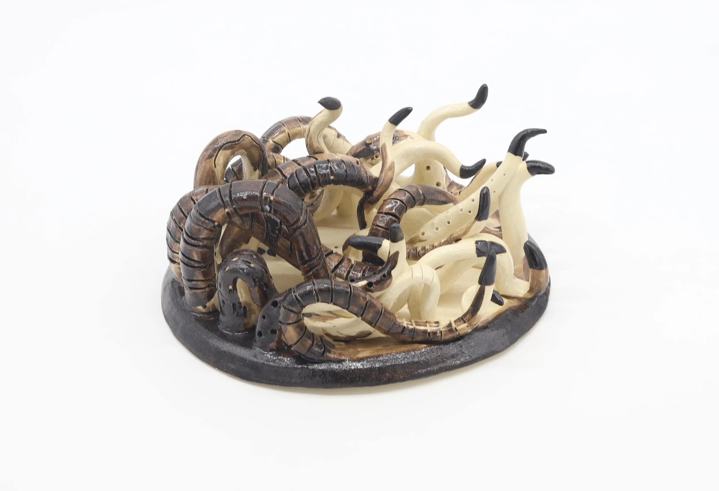 Move with the Flow,
Ceramic, 2020,
4” X 8” X 9.5” (H X W X D)	