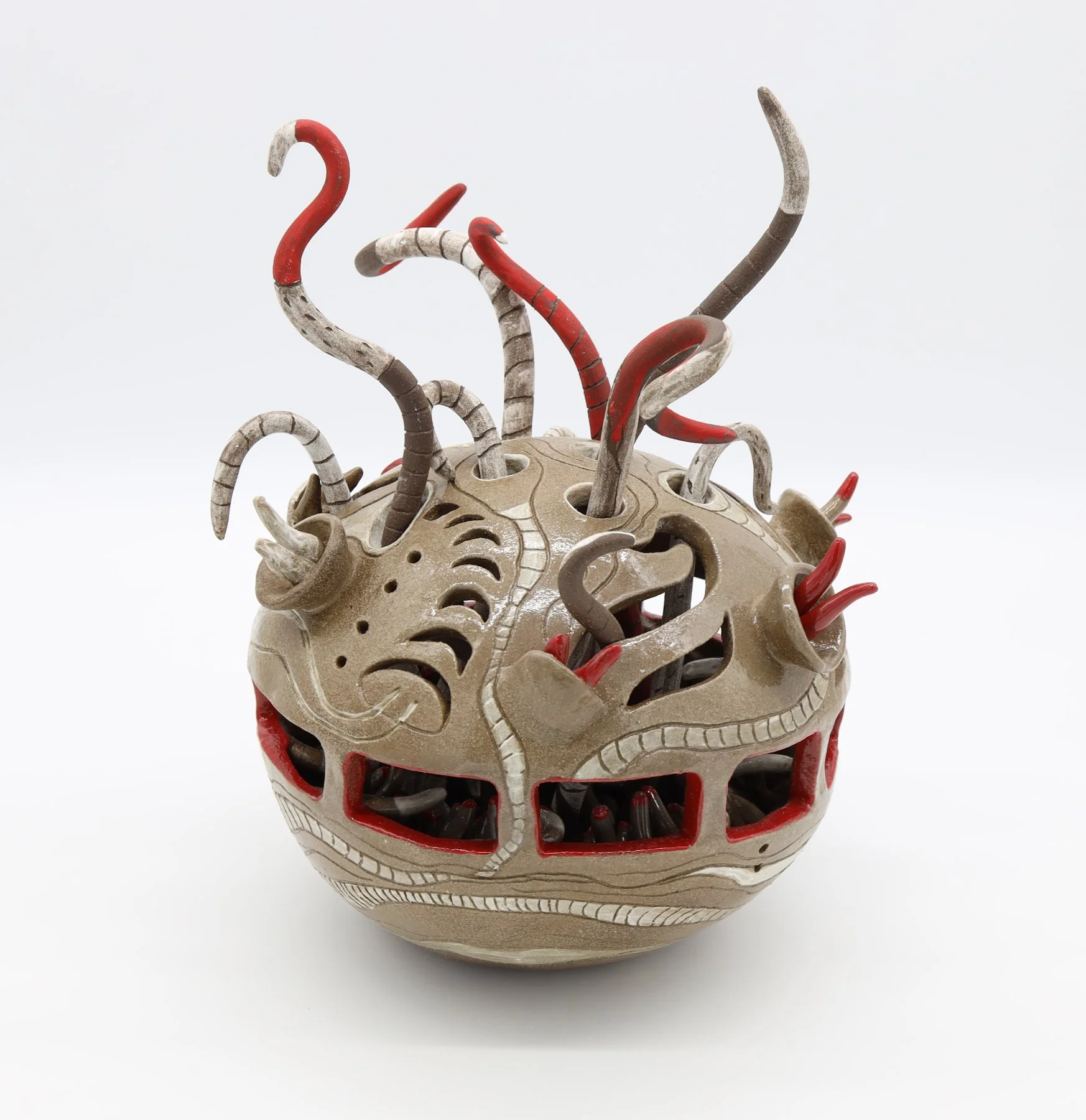 The Cosmic Realm,
Ceramic, 2024,
13.5” X 14” X 14” (H X W X D)