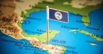 Map highlighting Belize with a blue flag on it.