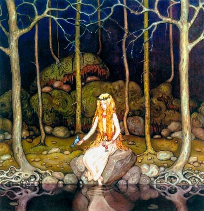 A woman with long red hair, wearing a white dress and a floral crown, sitting on a large rock in a forest. She is holding a bluebird in her right hand and another bird in her lap, with a calm expression. The forest has tall, slender trees with bare branches, and the background features dark, swirling foliage and rocks.