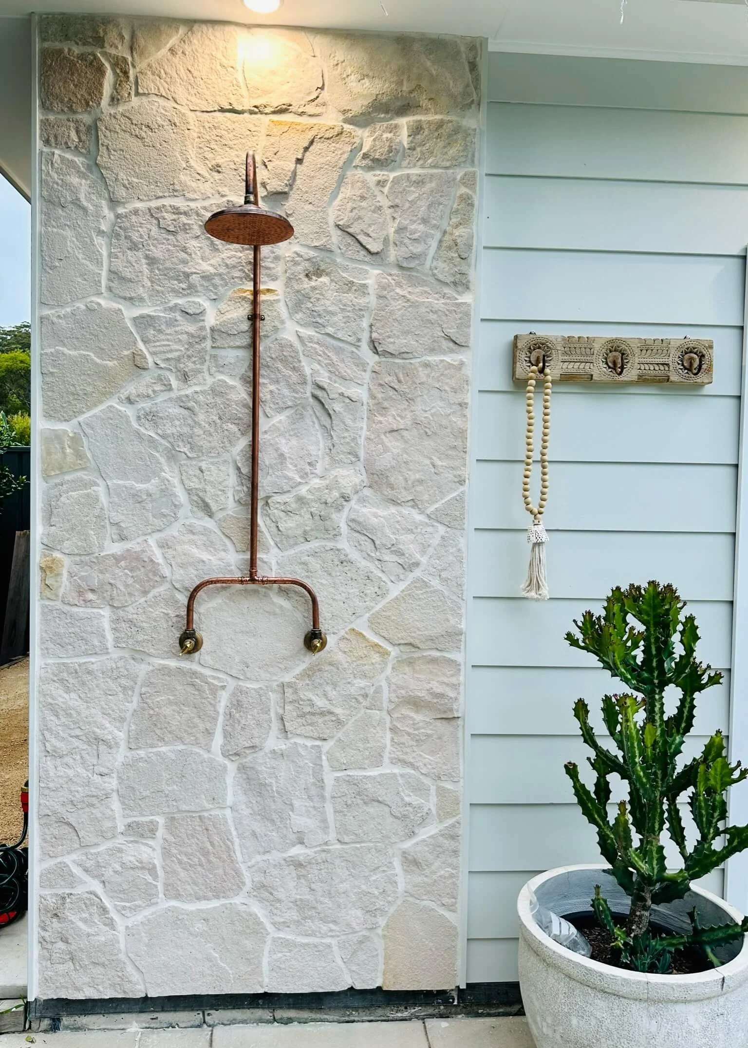 Sandstone feature wall cladding with outdoor shower, Central Coast NSW