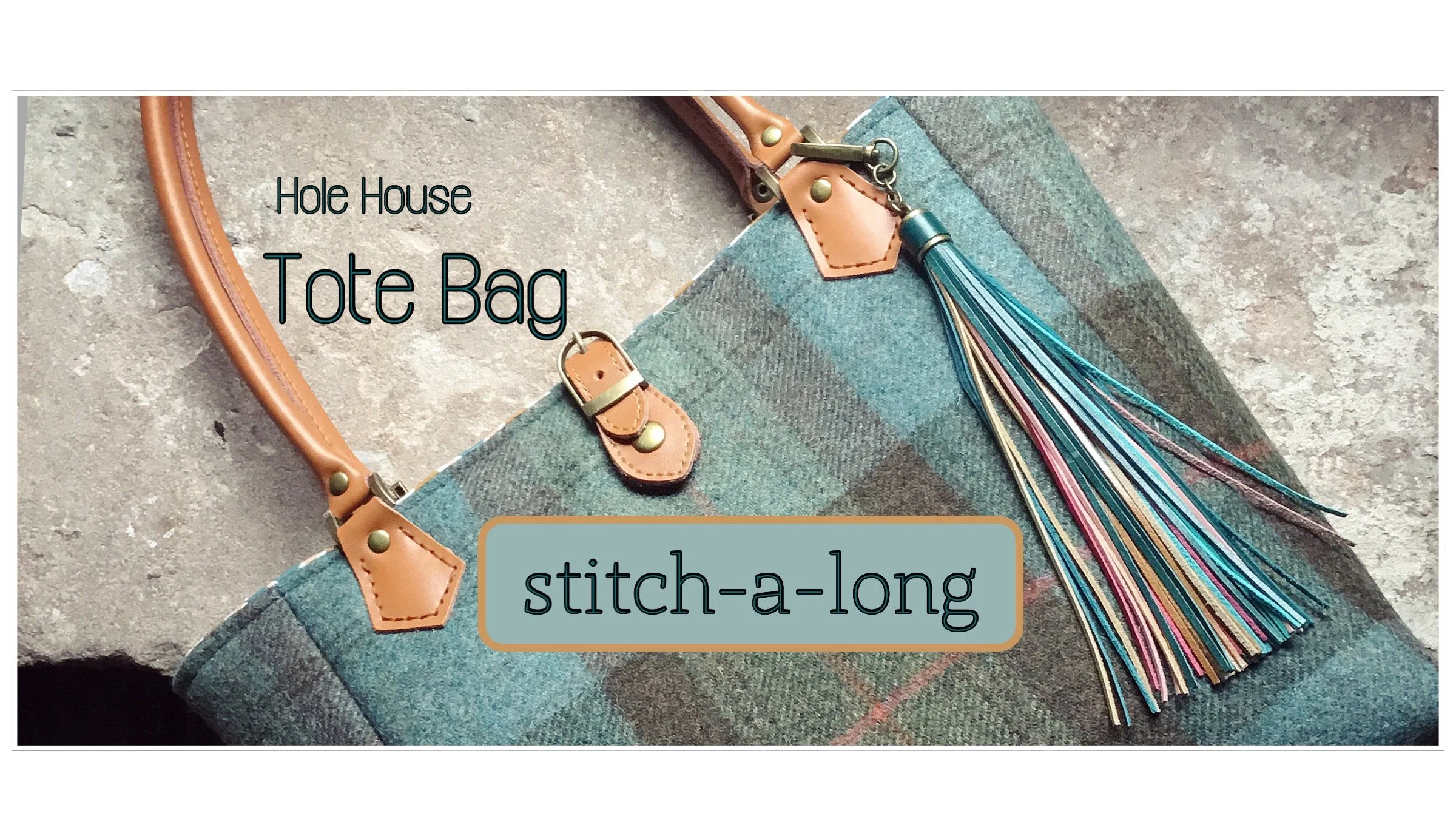 A plaid tote bag with leather straps, a tassel keychain, and a label that says "stitch-a-long." The background is a textured stone surface.