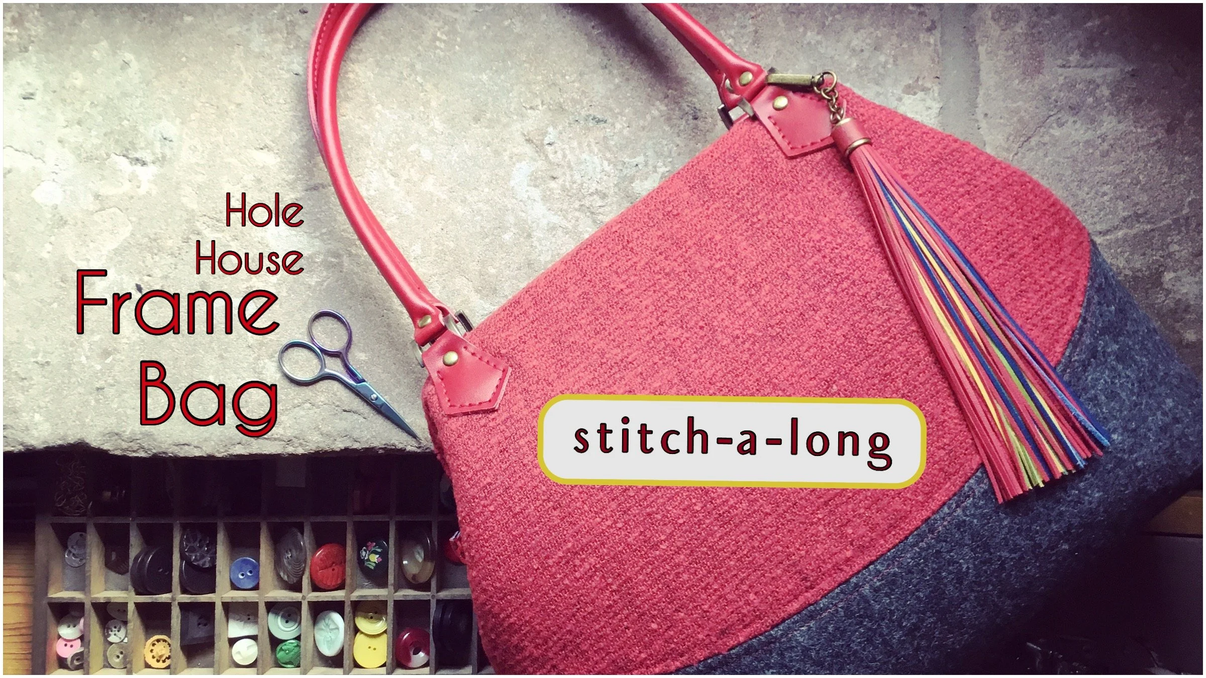 A pink tote bag with a colorful tassel hanging from the handle, placed on a concrete surface, with a pair of small scissors nearby. There is text overlay labeling parts of the bag and a sew-in label that reads 'stitch-a-long.' in a yellow-bordered white box.