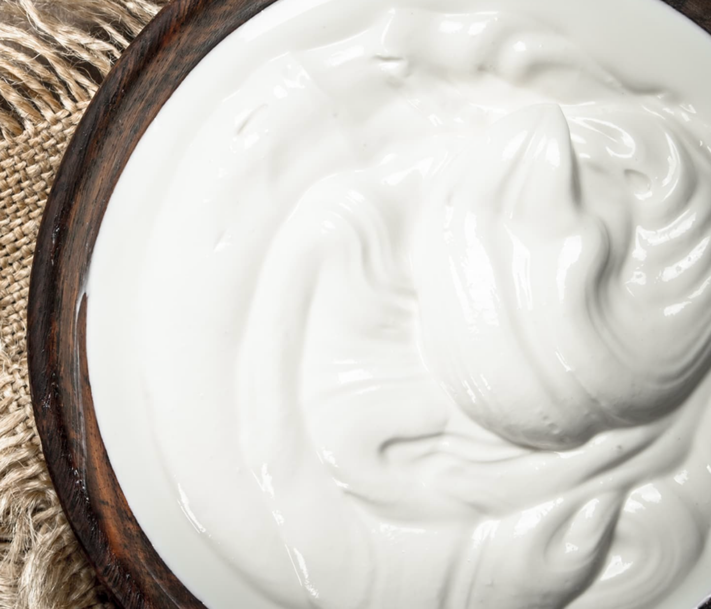 Plain unsweetened yogurt that can provide calcium and protein for dogs