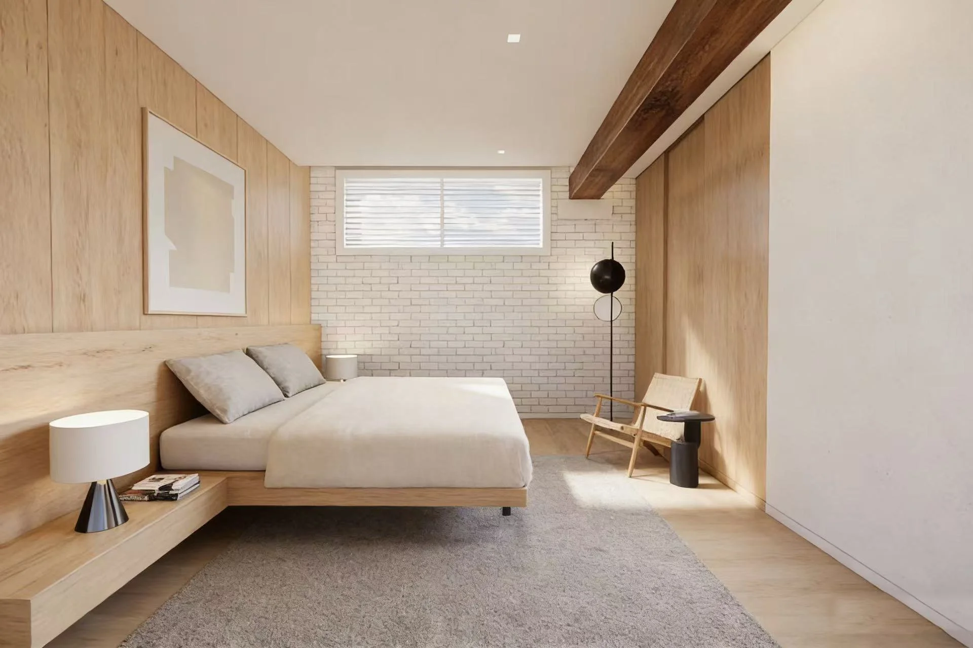 Minimalist bedroom with light wood walls, white brick accent wall, bed with grey pillows, small bedside lamps, a black standing lamp, a wooden chair with a side table, and a window with blinds.