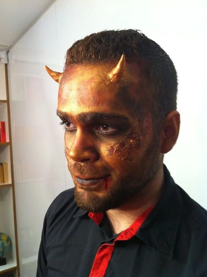Special effects horror clown makeup with prosthetic wound detail by English-speaking SFX makeup artist, event in Ibiza