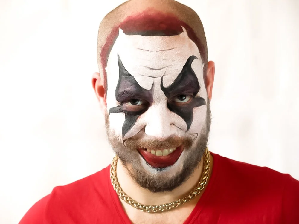 Special effects horror clown makeup with prosthetic wound detail by English-speaking SFX makeup artist, event in Ibiza