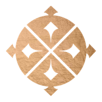 A wooden shuffleboard puck with four black diamond-shaped markings and a central X, viewed from above.