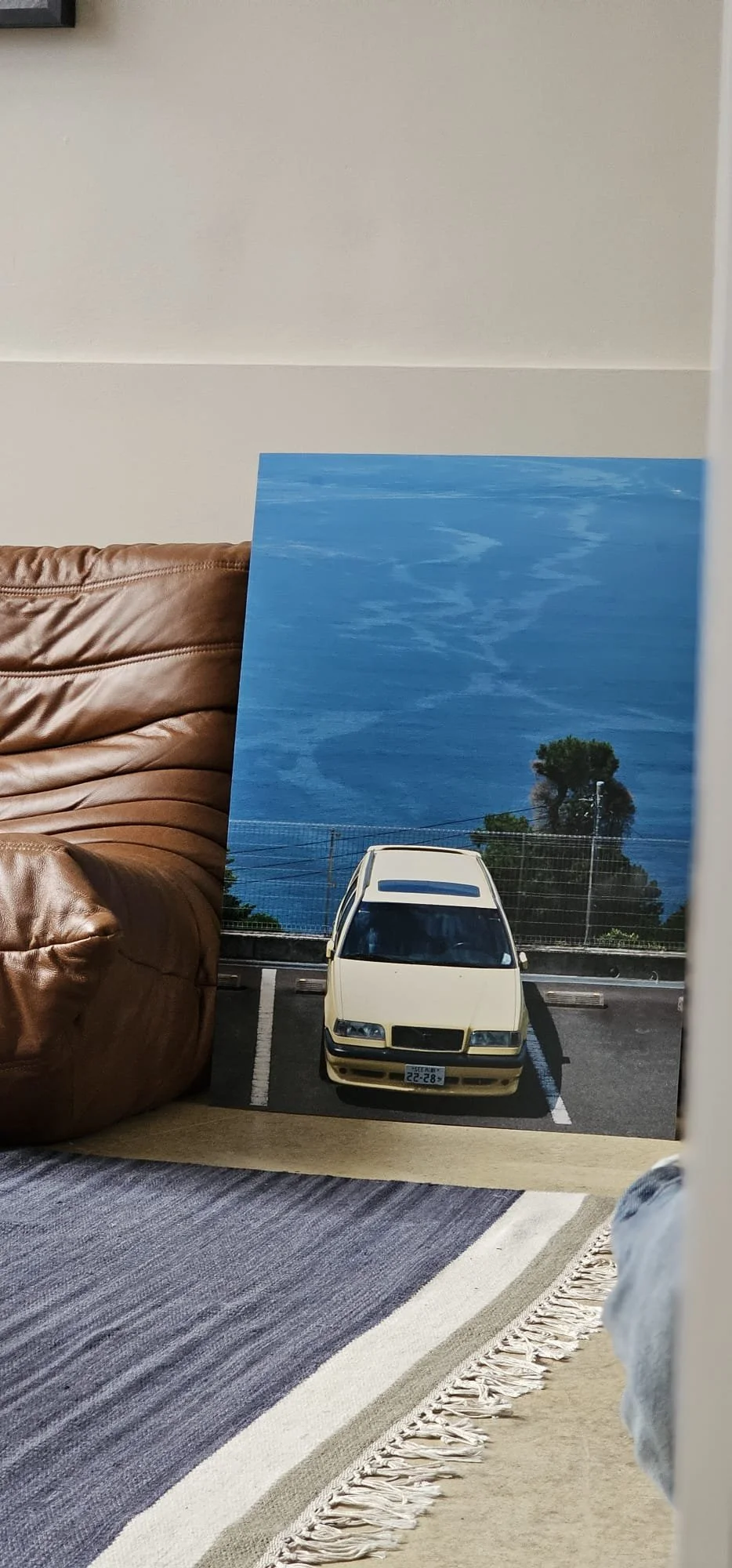 yellow car japan on the sea