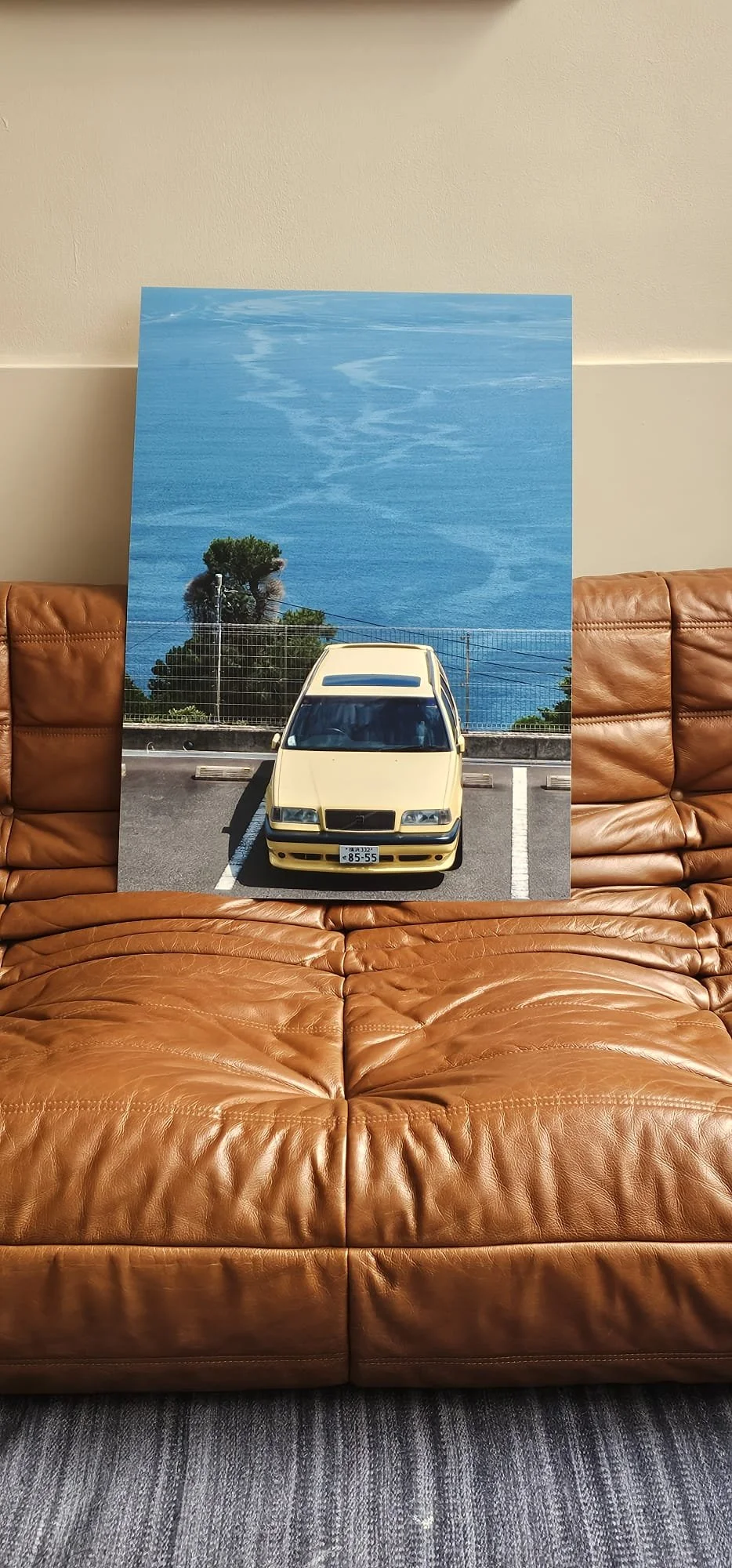 yellow car japan on the sea