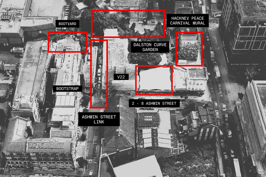 Aerial black-and-white photo of an urban area with labeled locations including Bootyard, Bootstrapping, Ashwin Street Link, V22, Dalston Curve Garden, Hackney Peace Carnival Mural, and 2-8 Ashwin Street, with streets and buildings visible.