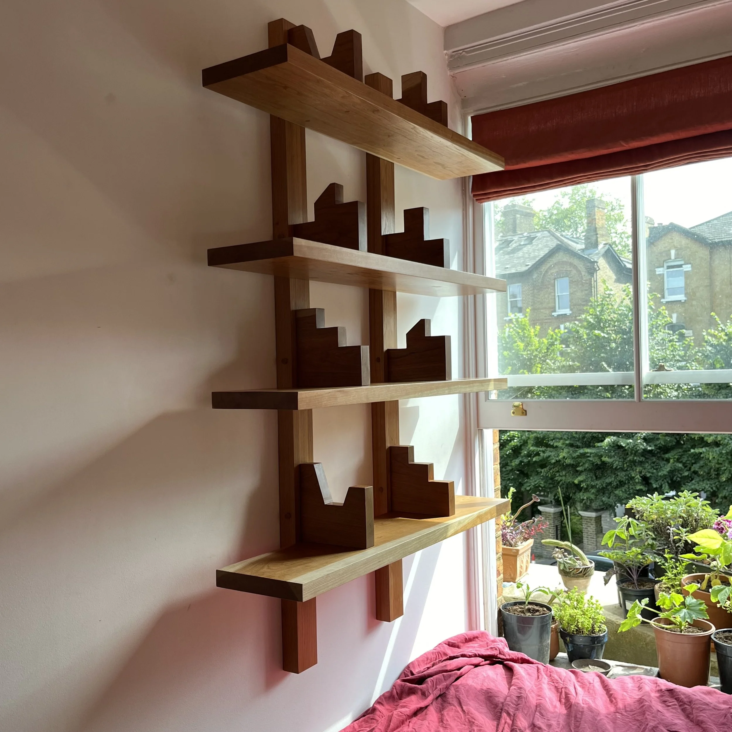 ...like a miniature city's skyline on your wall. 