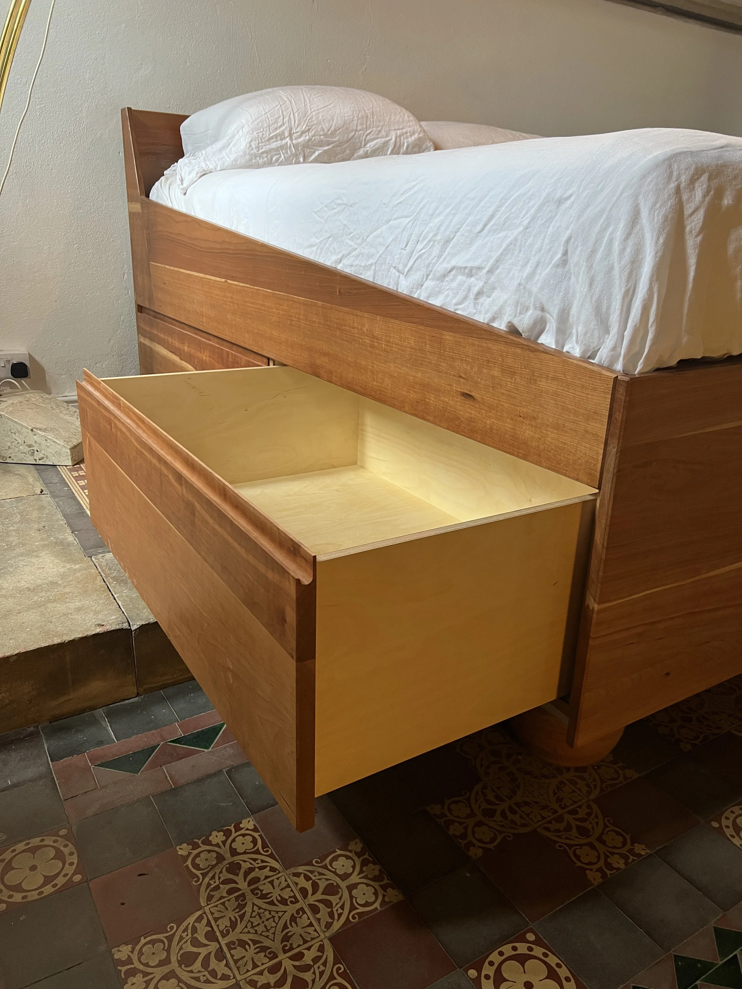 ...a comfortable bed with plenty of storage underneath...