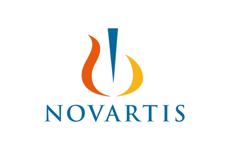 The NOVARTIS logo featuring a stylized flame with red, yellow, and blue elements and the company name in blue uppercase letters
