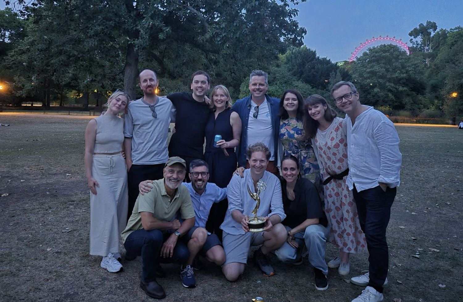 The team from Buy Now! The Shopping Conspiracy celebrates winning an Emmy for outstanding business and economic documentary.