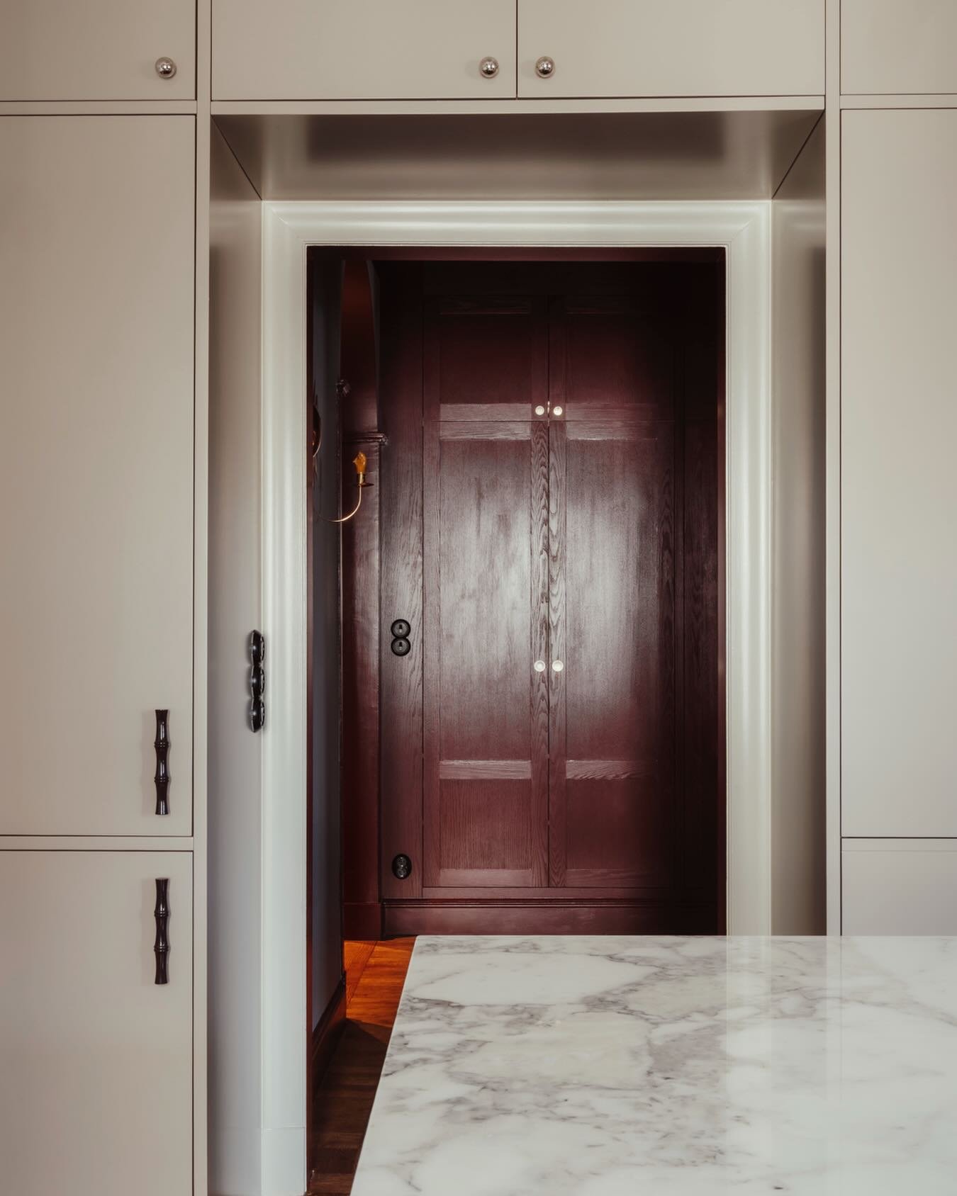 From the kitchen looking into the hallway at apt N