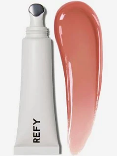 Reefy skincare product tube with a swatch of peach-colored cream beside it.