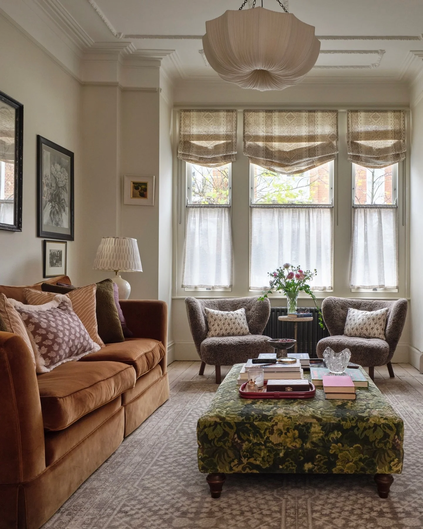 The formal living room at our Clapham project &hearts;️ Rich, earthy neutrals, gorgeous antiques, and the most beautiful patterns and textures (with the most stunning tapestry ottoman!)

I am still so in love with the scheme in this room, warm and vi