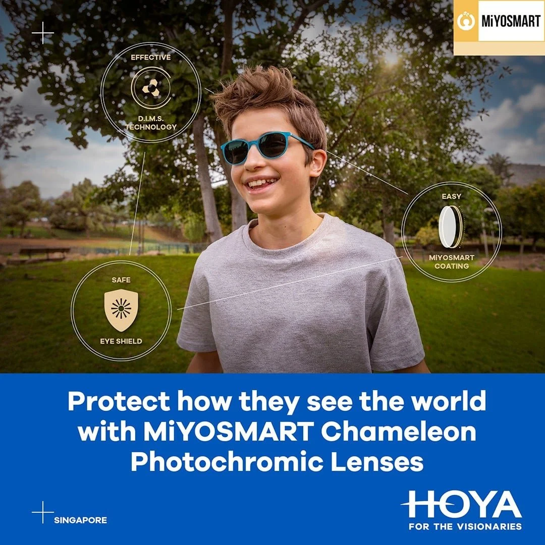 Child wearing MiyoSmart Chameleon photochromic myopia control lenses outdoors with lenses darkened in sunlight