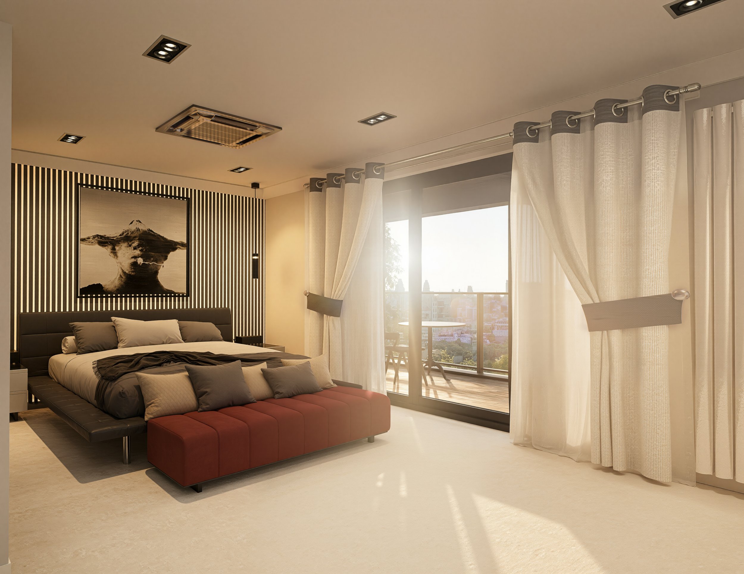 Modern bedroom with a low-profile bed, gray bedding, black and red bench, black and white artwork of a volcano, cream-colored curtains, and large windows letting in natural light.